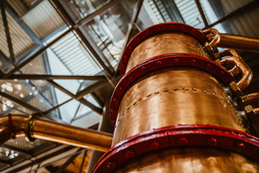 tall bronze barrel below skylight