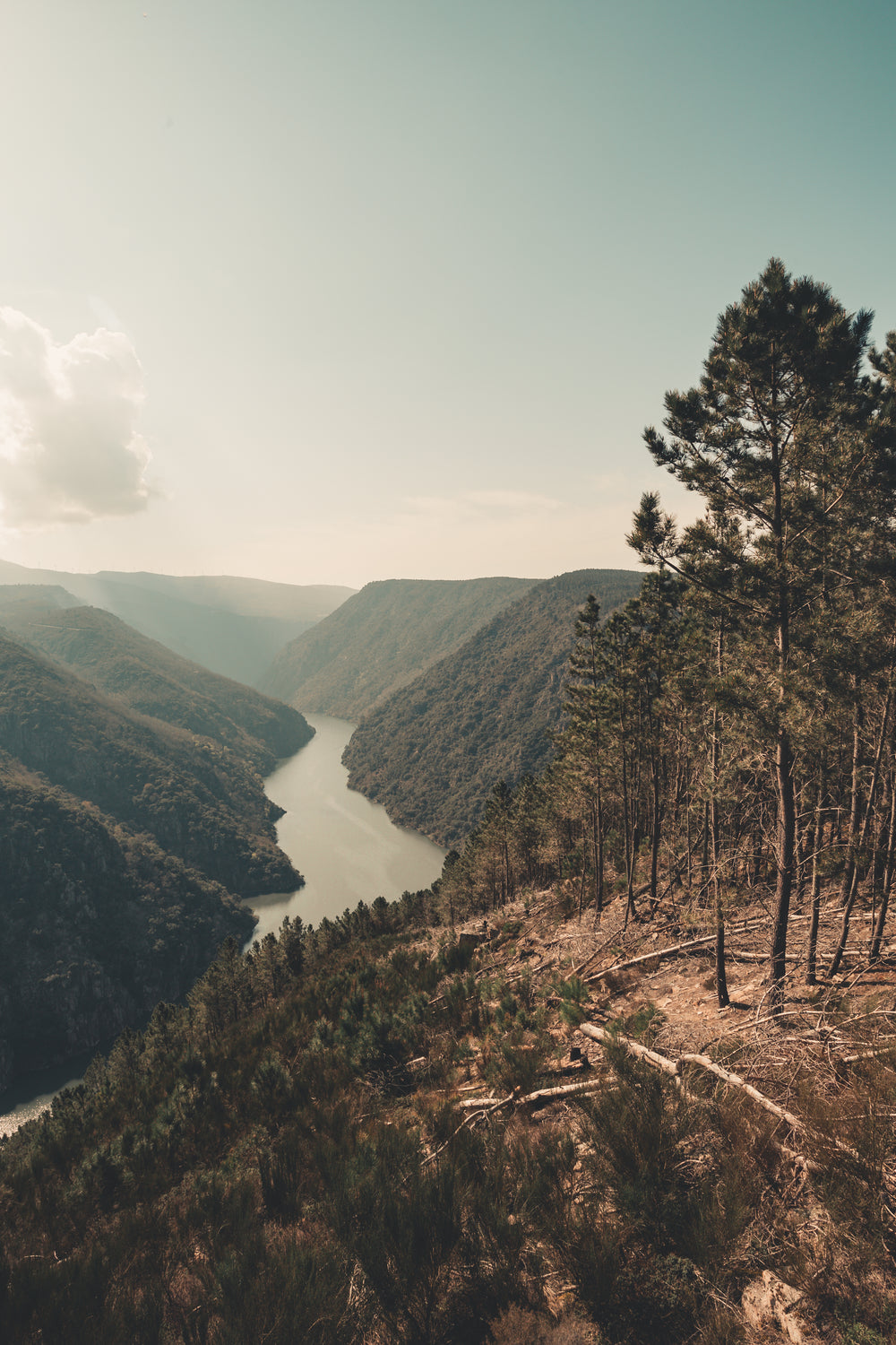 tall hills and a body of water running in between them