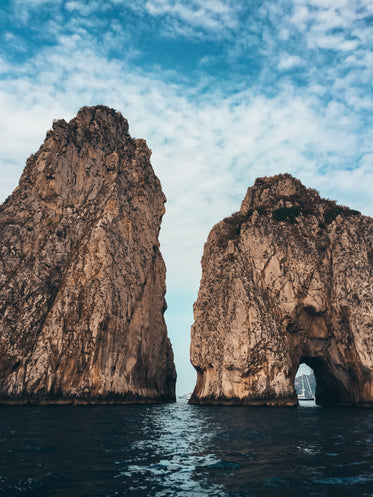 tall rock formations guard the bay