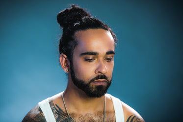 Free Tattood Man Looking Sad Image: Browse 1000s of Pics