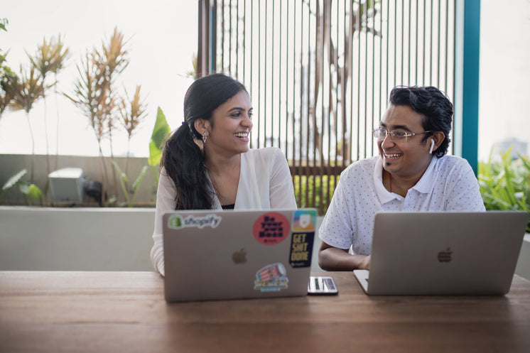 Team Shares A Laugh In Modern Coworking Space In India