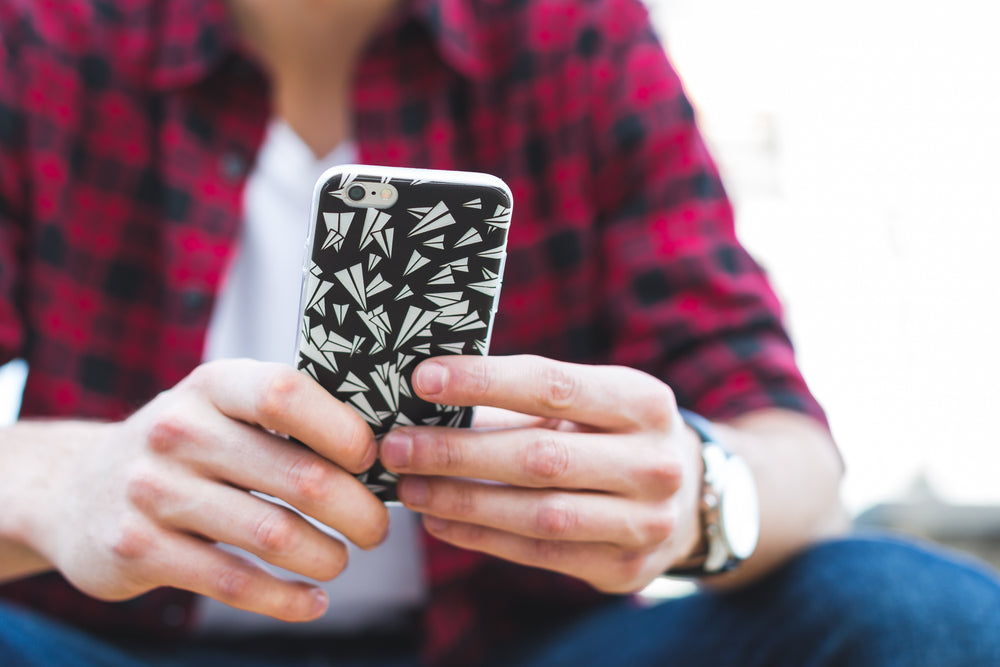 teen texting on smartphone