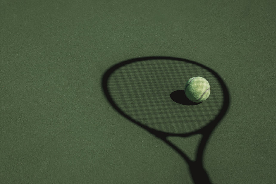 Browse Free HD Images of Tennis Ball Sits In The Shadow Cast By A ...