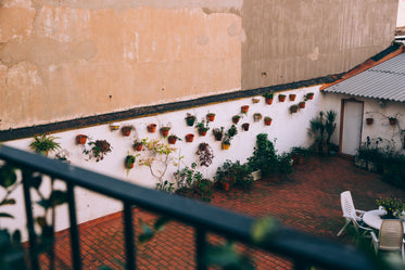 terracotta planters hung on a wall