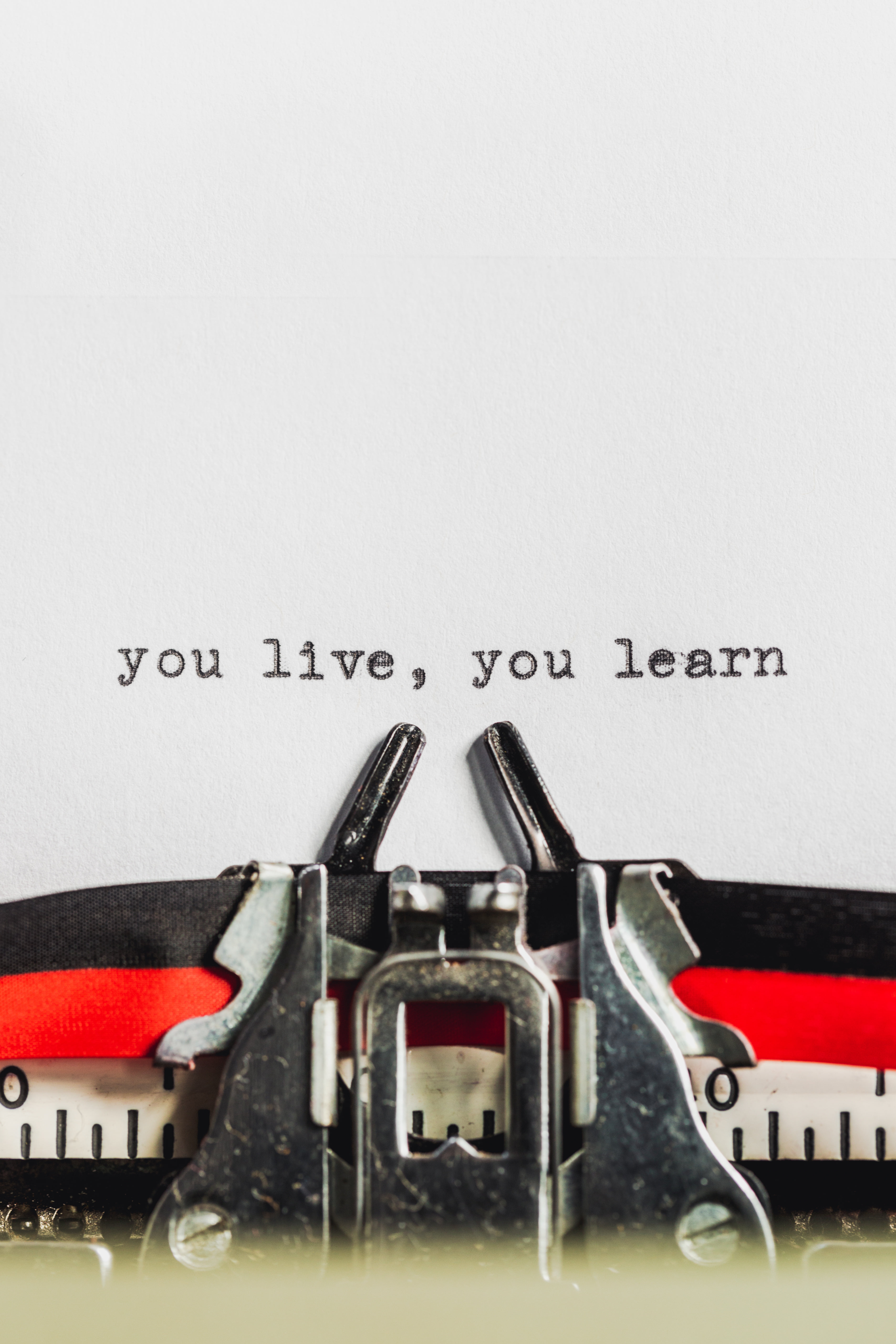 text-on-typewriter-states-you-live-you-l