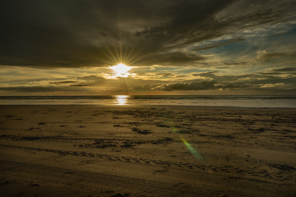 textured beach sands at sunset