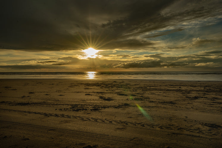 Textured Beach Sands At Sunset