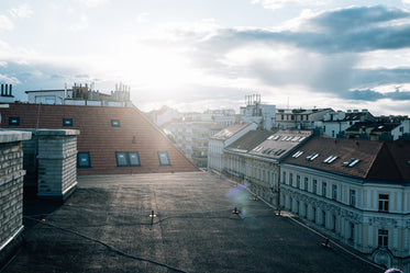 the flat rooftop of a building in hazy light