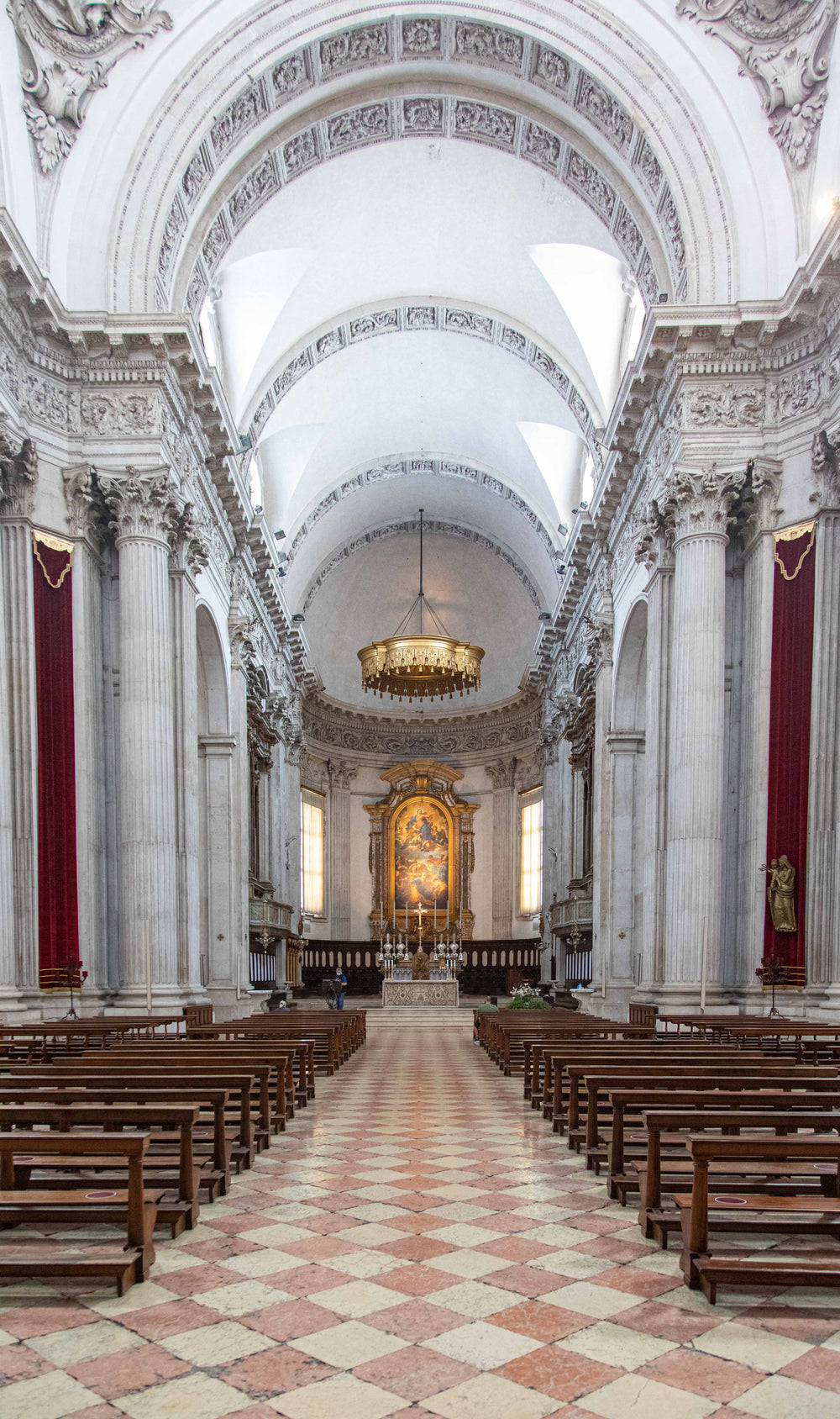 the interior of a white church