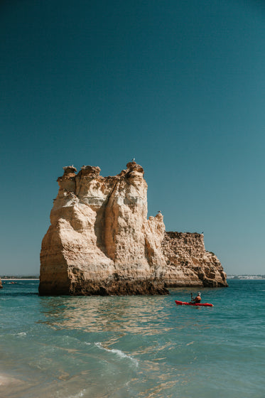 the kayak and the rock