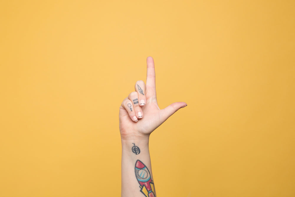 the letter "l" displayed in american sign language
