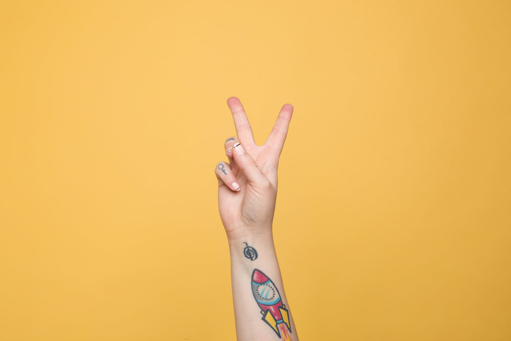 the letter "v" displayed in american sign language