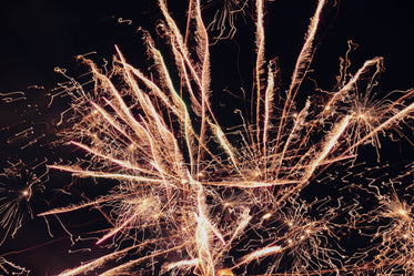 the light streams of fireworks at night