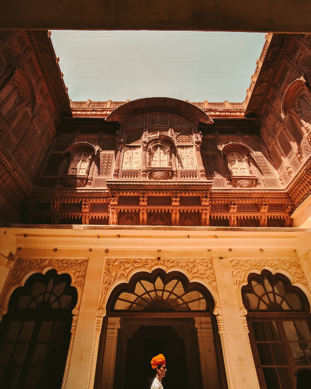 the relief on a building's facade in sunlight