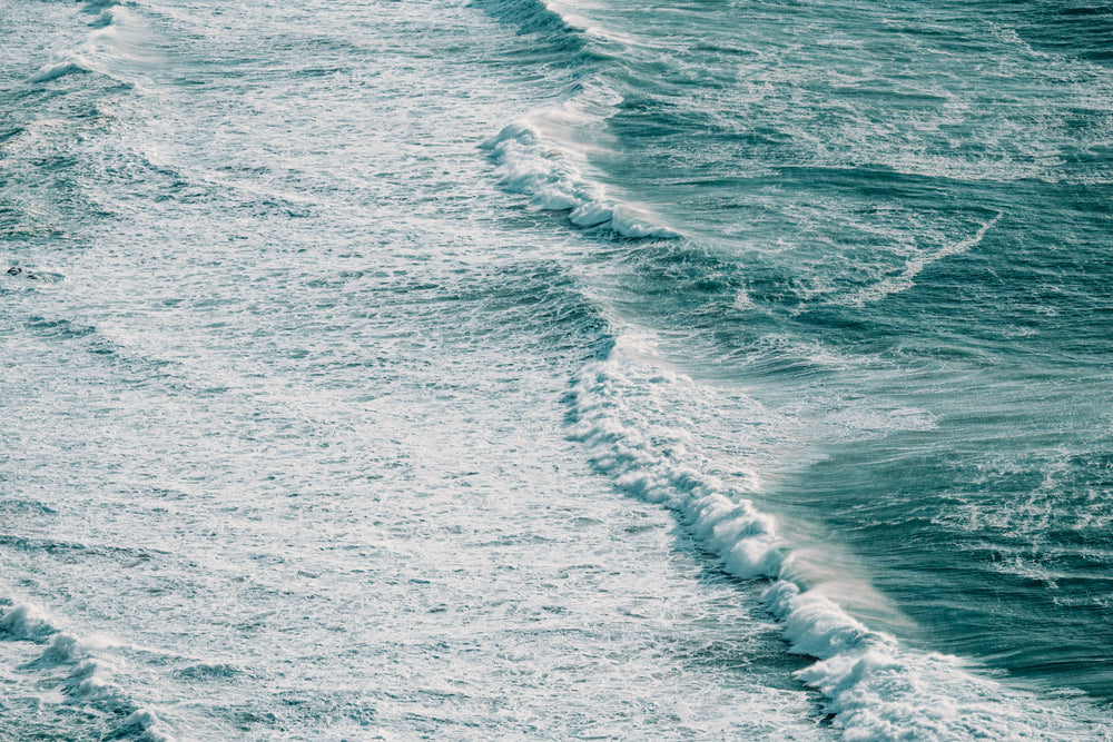 the rough wavy waters of the ocean