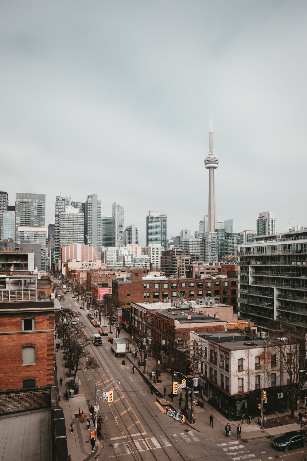 the toronto tower against a grey sky