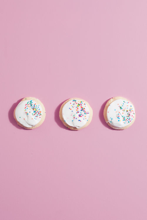three cookies on pink