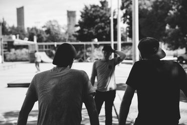 three guys at skatepark