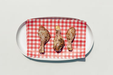 three marinated chicken ready to grill