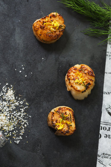 three scallops on slate