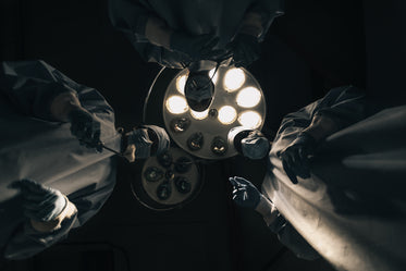 three surgeons stare down during surgery