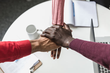 three team hands