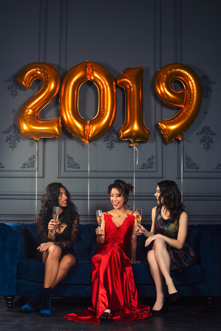 three-women-laughing-at-new-year-s-eve-p