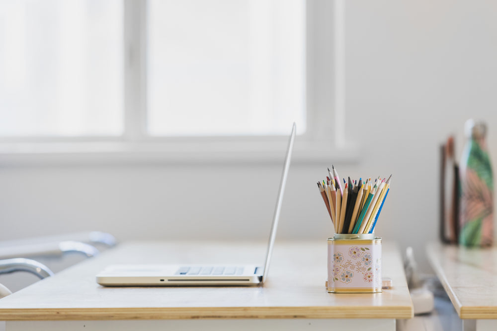 tidy desk in window light