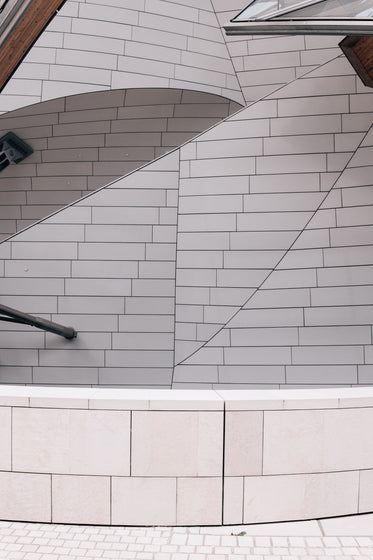 tiles reflected in curved glass windows