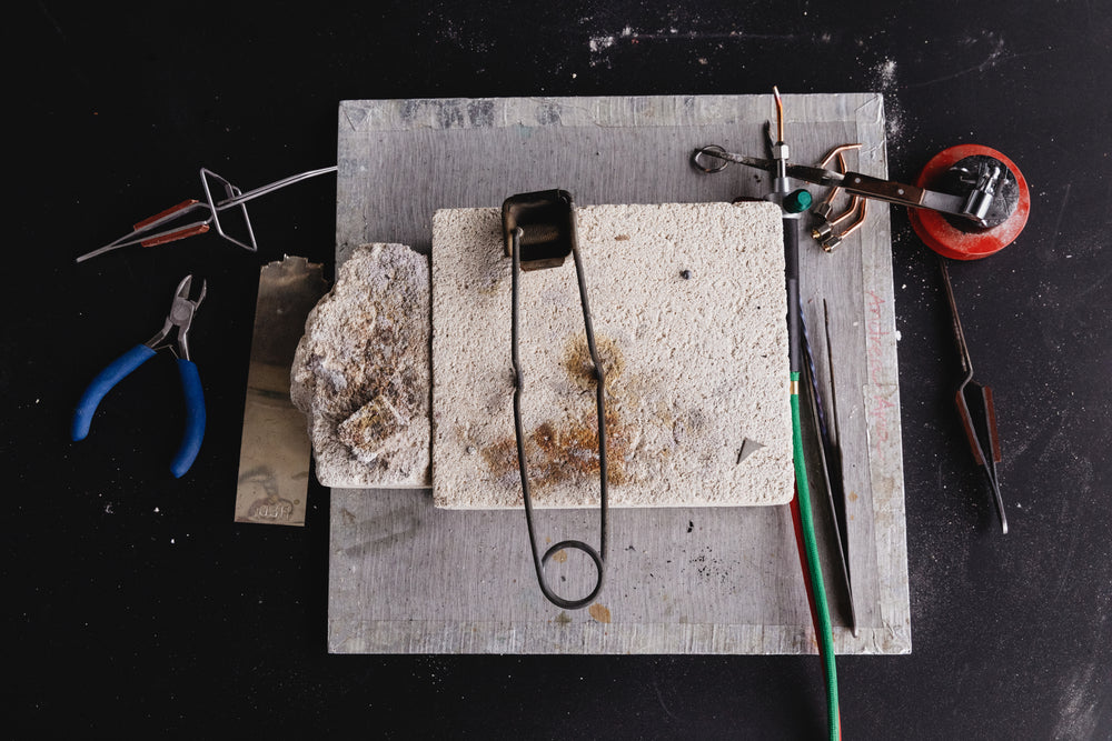 tools and brick on workbench