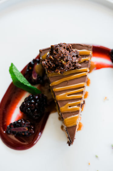 top view of chocolate cake with raspberry coulis