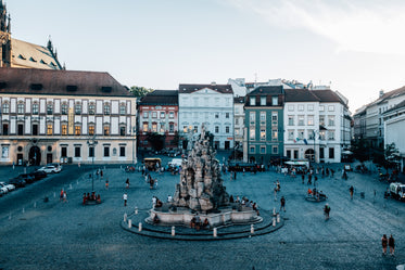 town square with a large stone sculpture in the center