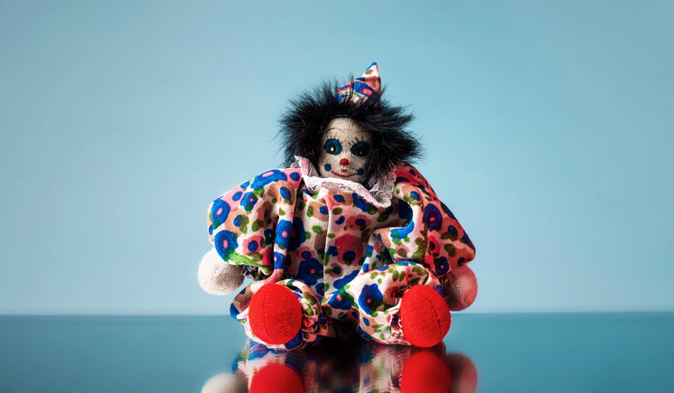 toy-clown-doll-sits-on-mirror.jpg?width=