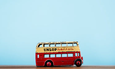 toy double decker bus on blue