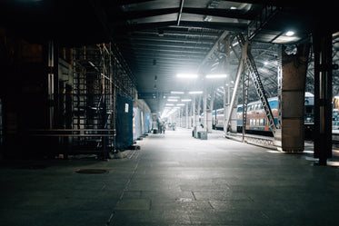 train sitting in an empty train station