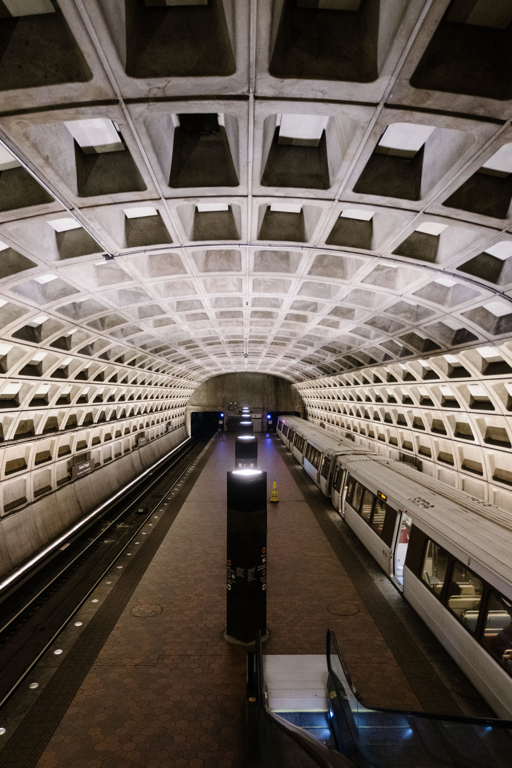 transit platform viewed from an escalator