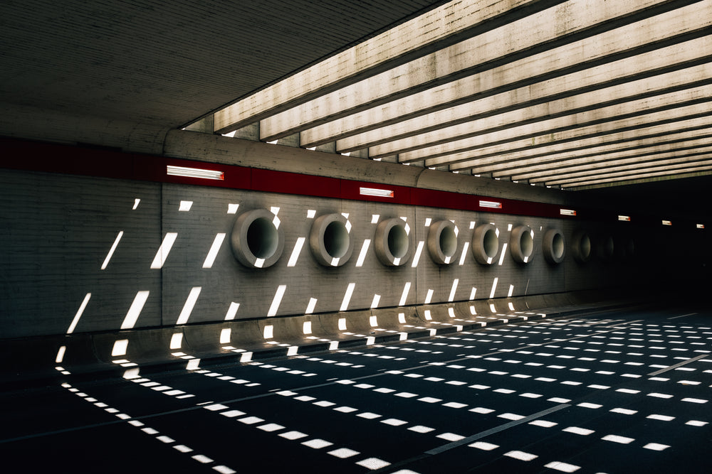 tunnels in a wall under beams