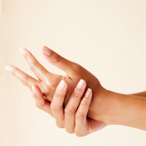 Two Hands Running In Skincare Treatment