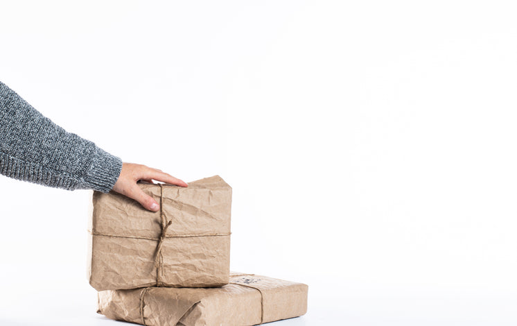 two-packages-wrapped-in-kraft-paper-and-twine.jpg?width=746&format=pjpg&exif=0&iptc=0