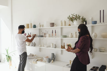 two people shopping in home interior design store