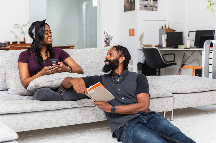 two-people-sitting-in-their-lounge.jpg?w