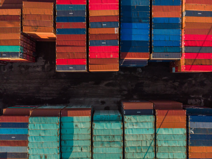 two-rows-of-stacked-shipping-containers.