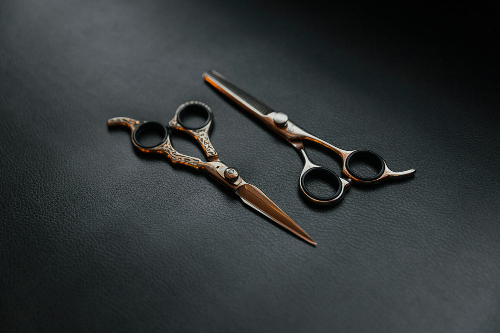 two sets of barber scissors