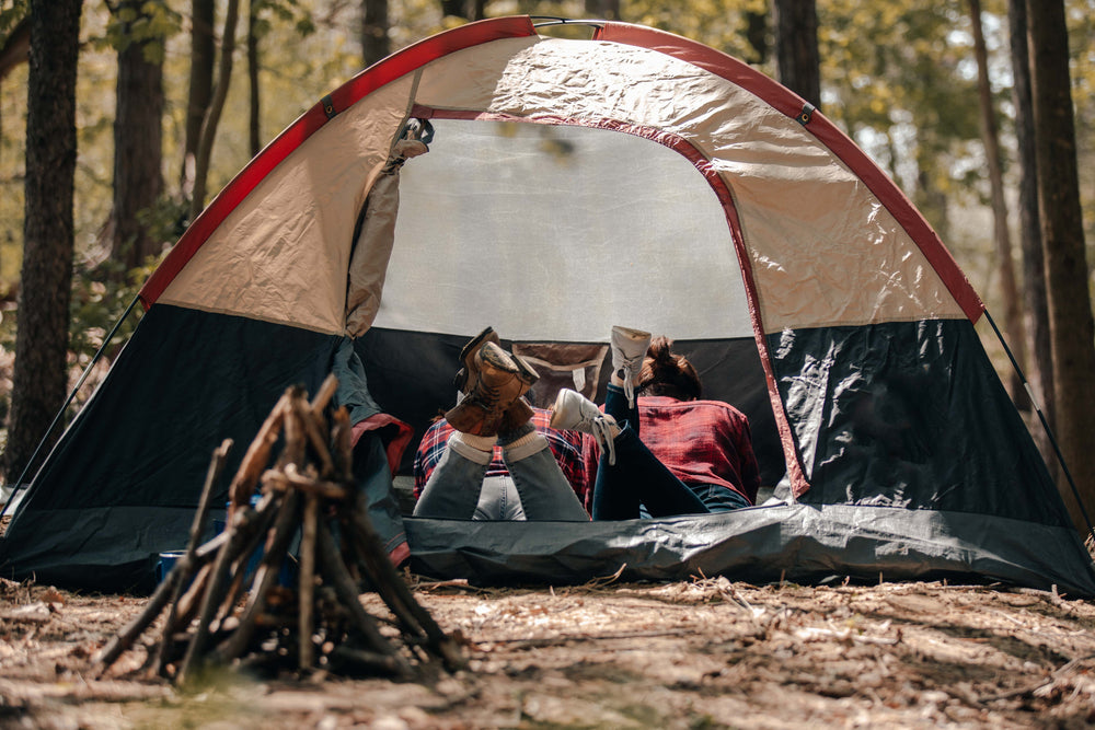 two women in a tent