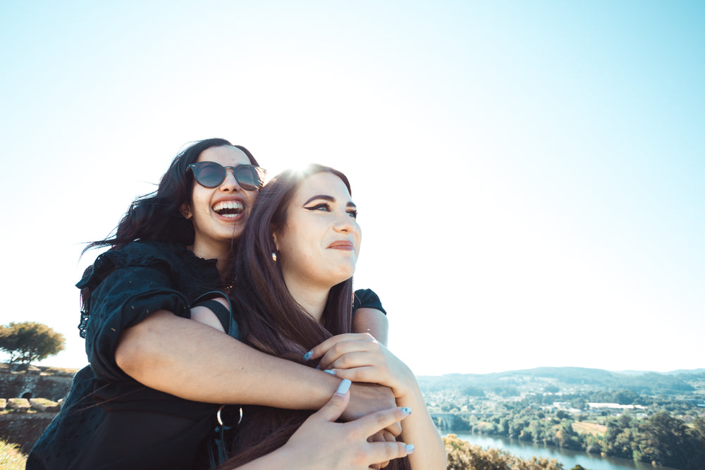 two women look out into the distance together