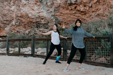 two women warming up on the beach