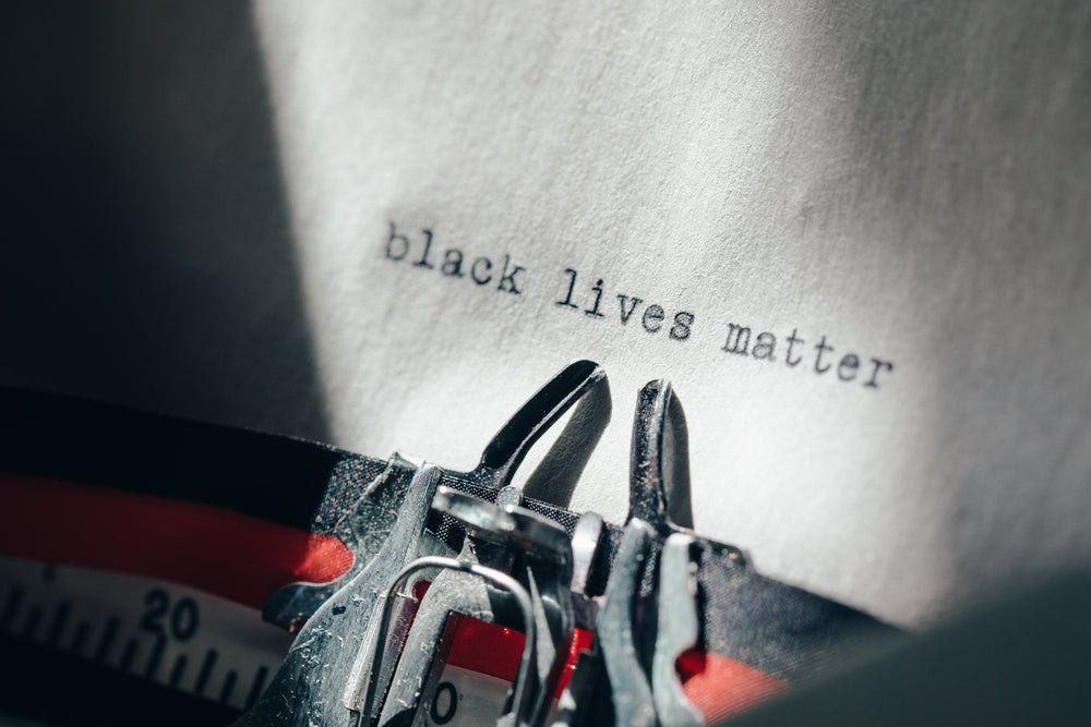 typewriter close up with black lives matter