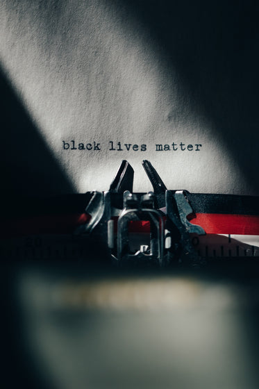 typewriter with black lives matter