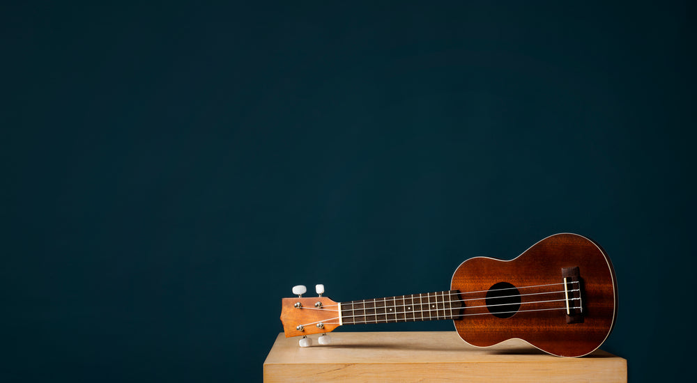 ukulele on blue background