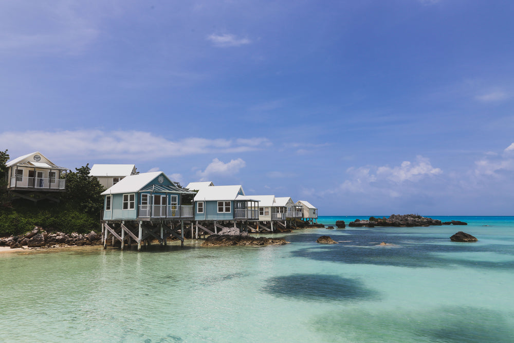 vacation homes sit above the sea